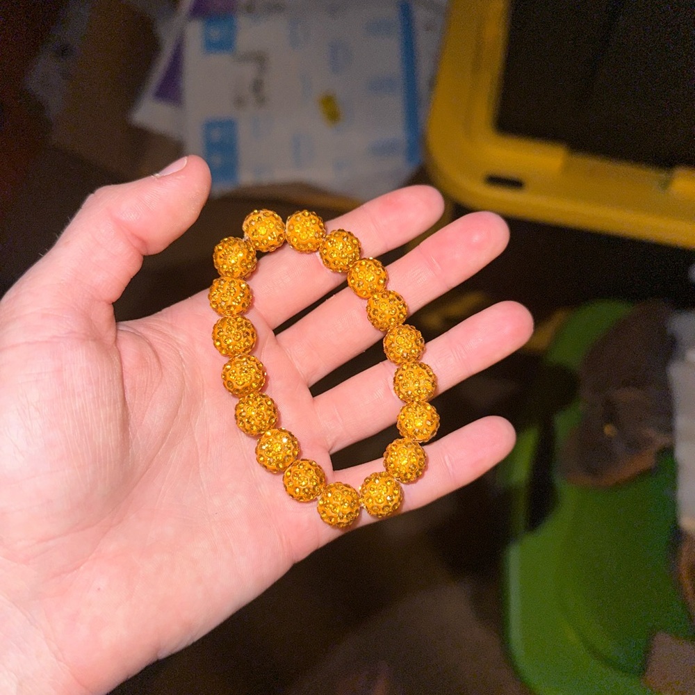 Orange rhinestoned bracelet